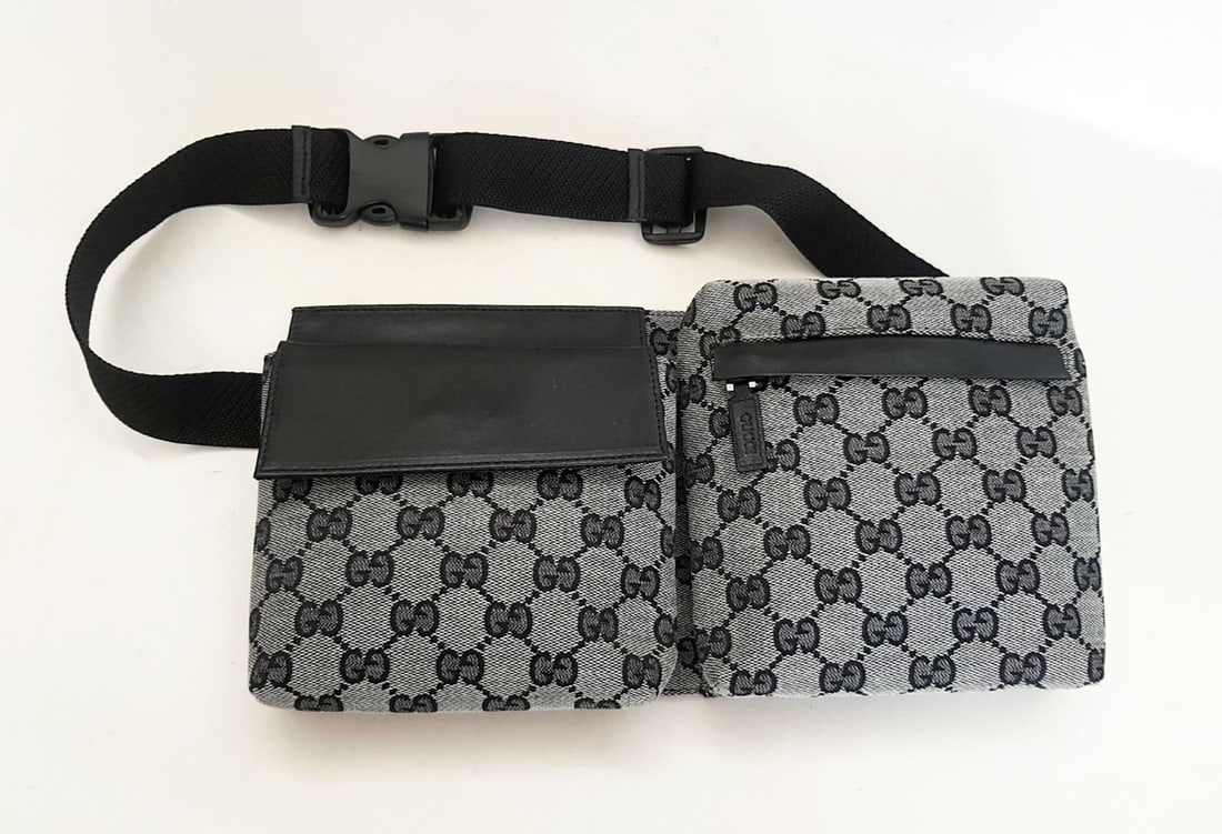 GUCCI CANVAS BELT BAG: GUCCI GG MONOGRAM CANVAS WEB DOUBLE POCKET BELT BAG This Gucci Waist Bag in Monogram canvas. The back of this belt bag features a zip pocket. The front has two pockets, one with a zipper and one with 