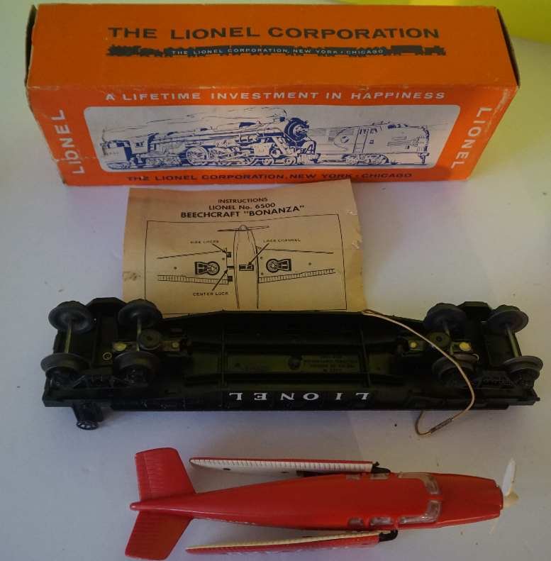 lionel 6500 beech craft bonanza red over white c8+: I think the unit is unrun- you decide.there appear to be no structural defects on plane.has instructions and original tie-down.No reserve- you bid- you buy!SHIPPING IN LOWER 48 IS $10 We ship in house