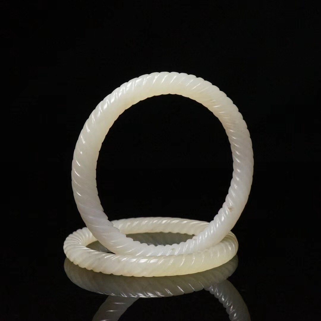 A pair of Chinese Qing Dynasty Hetian Jade Bracelets (1 of 5)