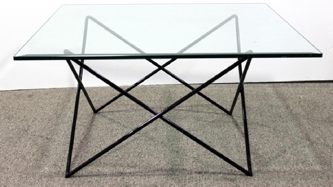 Modern Glass Top Cocktail Table: Modern glass top table with iron base. Good condition. 15H x 31.5 Square