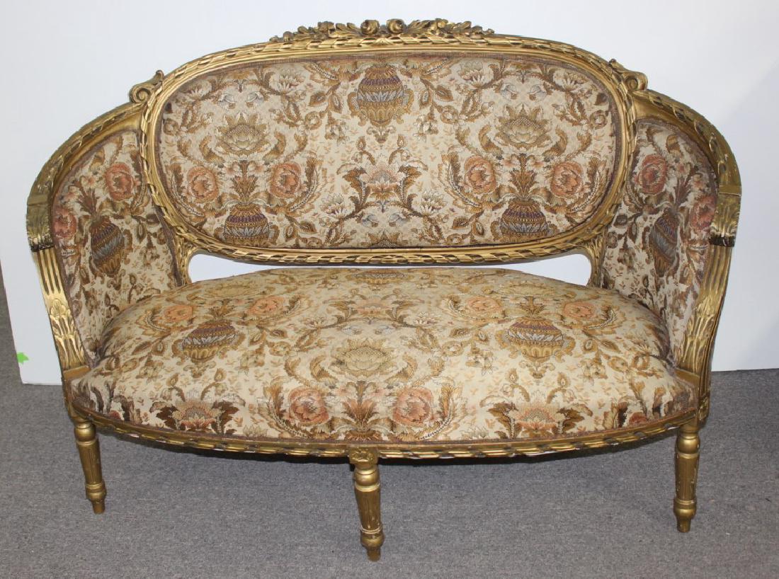 7 Piece 19th C. French Settee Set: Condition: missing gold paint. Overall Good for age. Dimensions approx: Couch 37.5H x 56W x 26D in. 2 armed chairs 37.5H x 28.5W x 24D in. 4 chairs 40H x 19W x 20D in.