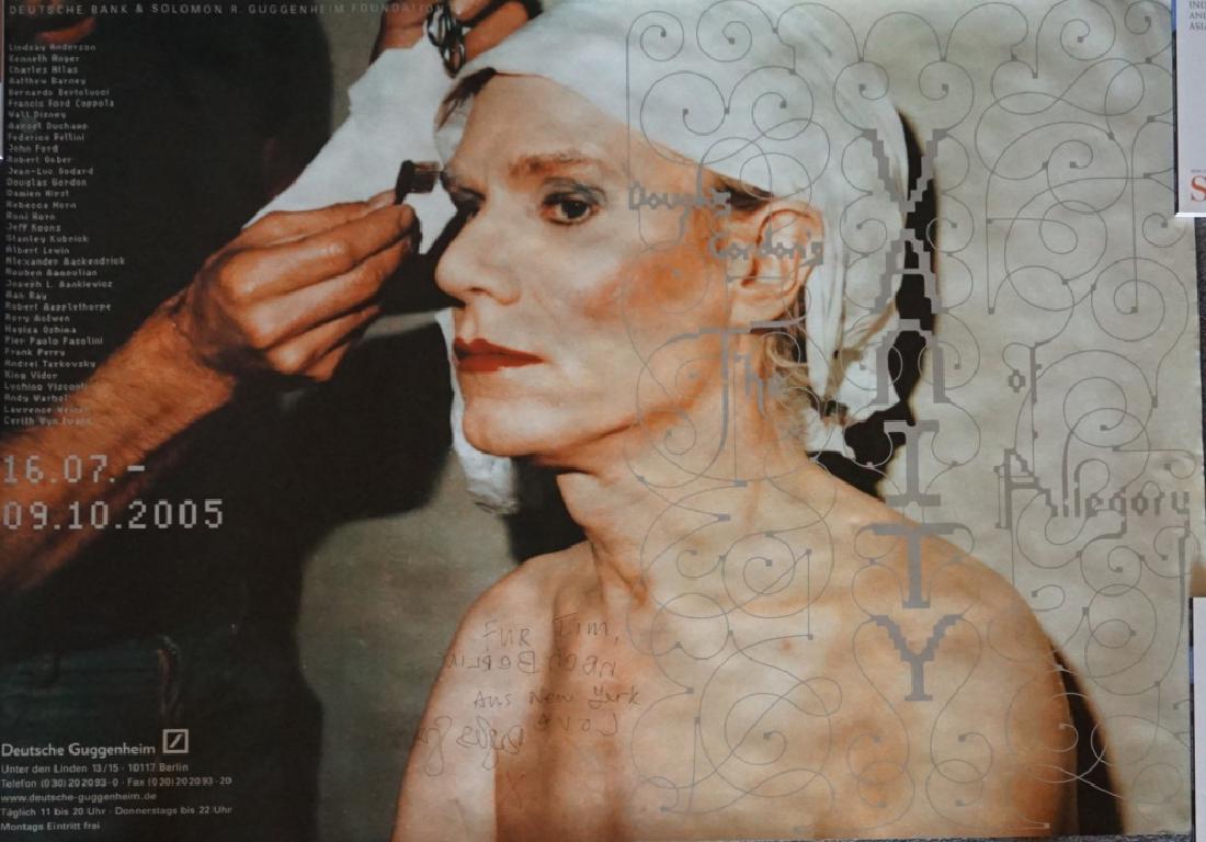 Douglas Cooper Poster Signed #128: Poster Title: Douglas Gordon's The Vanity of Allegory. Inscribed: "For Tim (Hunt) Berlin, Aus New York, Love Douglas Gordon" 33h x 47w in. Deutsche Guggenheim 2005 Sitter: Andy Warhol doing drag.