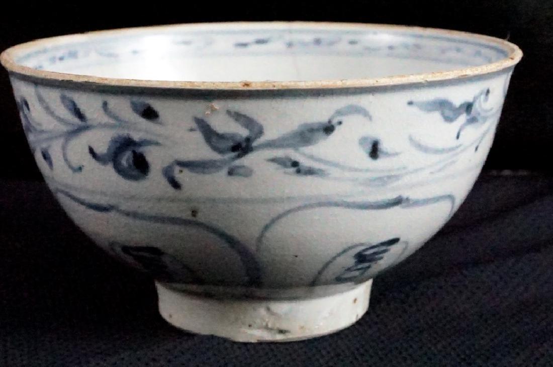 15th C. Vietnamese Hoi An Hoard Shipwreck Dish Bowl: A Vietnamese blue and white bowl or dish from the 15th century Hoi An shipwreck. In excellent condition and with authenticity sticker on back. 3.25h x 6.25w in. Provenance: Butterfield's Auction Decem