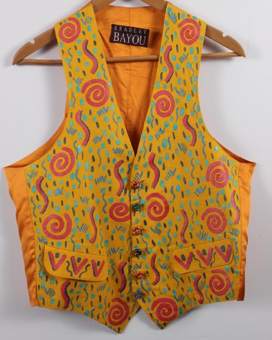 Bradley Bayou Vest (Men's): Linen Print front. 6 Chinese dragon face bottoms. Aqua/Blue/Red on bright yellow back ground. 16.5 in. wide front; 21 in. wide back. 22 in long back of neck to bottom.