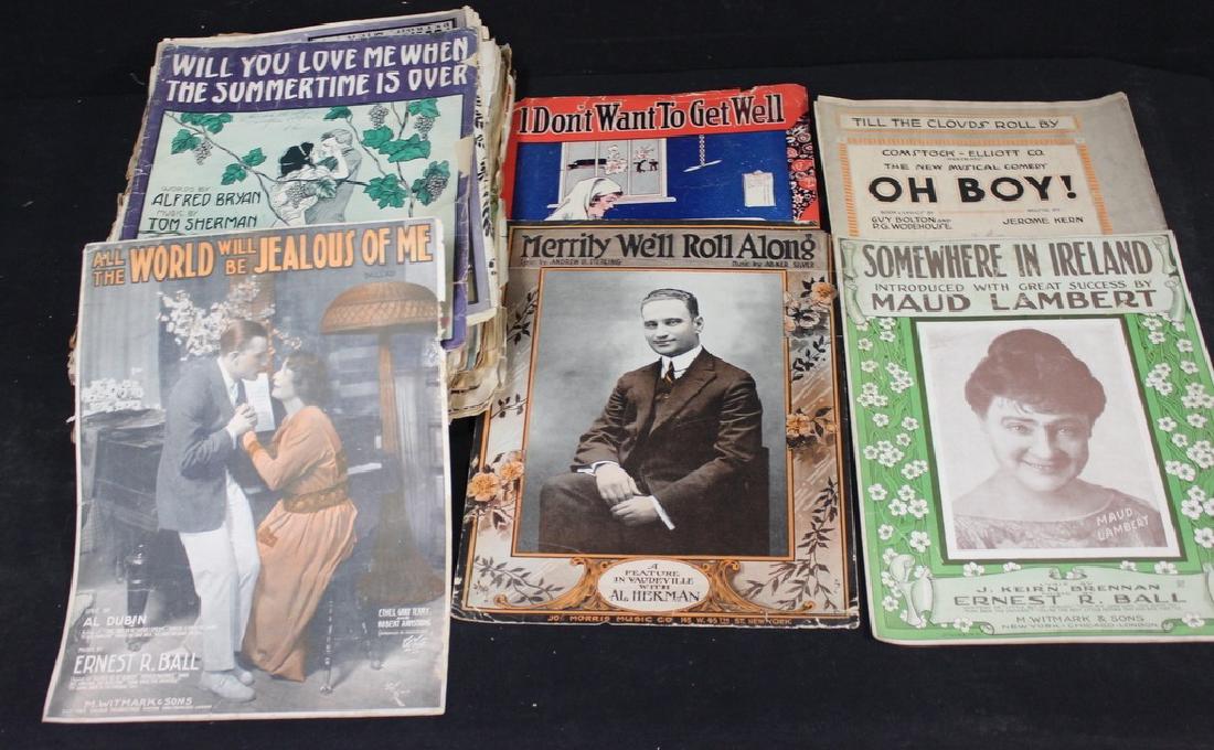 Antique/Vintage Sheet Music: Lot of ver 50 pieces of sheet music. Beautiful graphics, nice titles. Most have wear and tear. Goldfinch Auctions can ship this lot in-house.