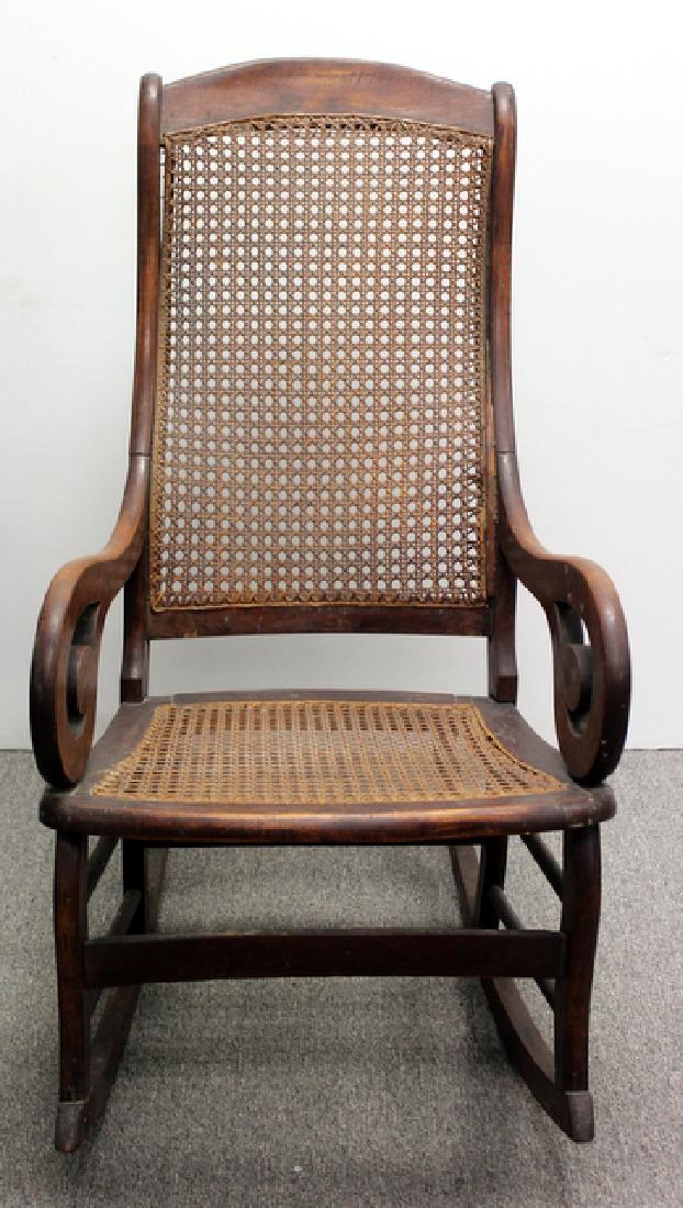 Caned Rocking Chair: 39H x 20W x 33D