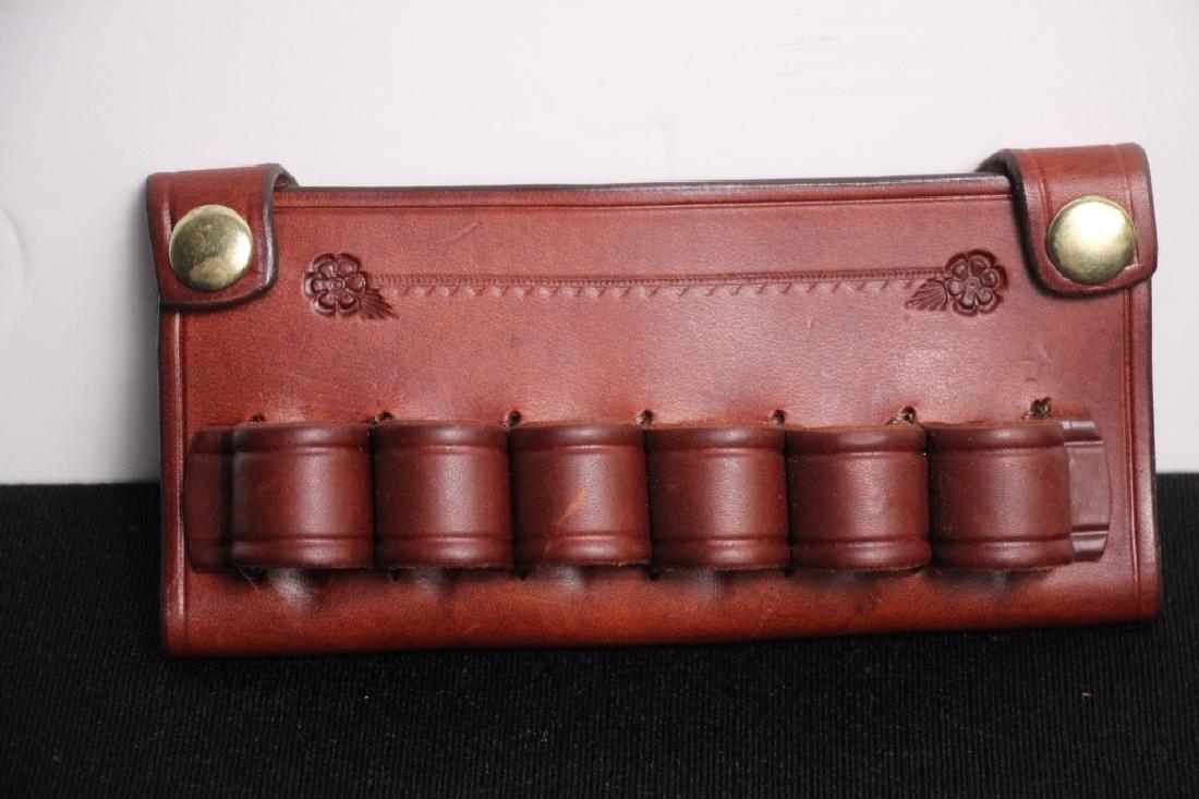 Shotgun Shell Holder for Belt: San Pedro Saddlery, like new condition. Leather w/snaps. 3.25h x 7w x 1.5d inches. Goldfinch Auctions can ship this lot in-house.