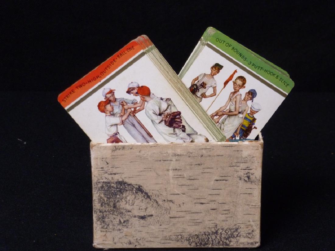 Pair Norman Rockwell Printed Playing Cards: Holder is 2.5 hx 4 w x 1.5 d inches.