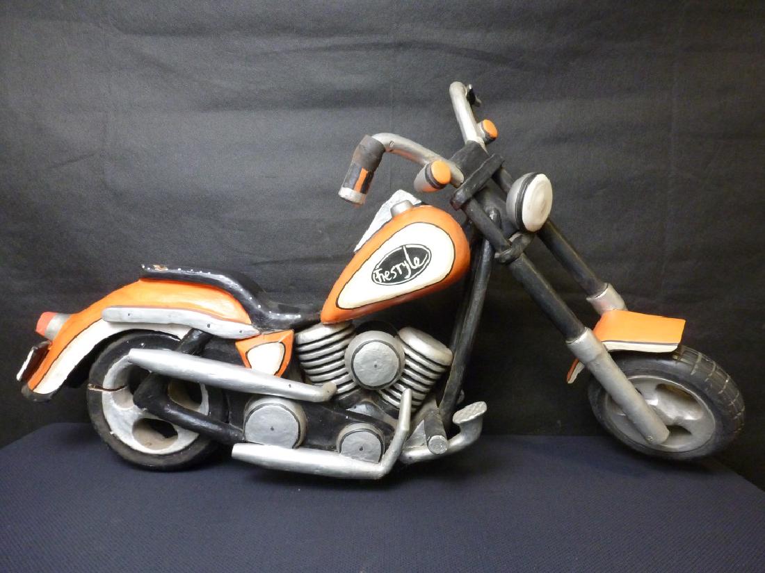 Carved Wood Harley Freestyle Motorcycle: 18 h x 30 x 15 w inches. Damage to right handle.