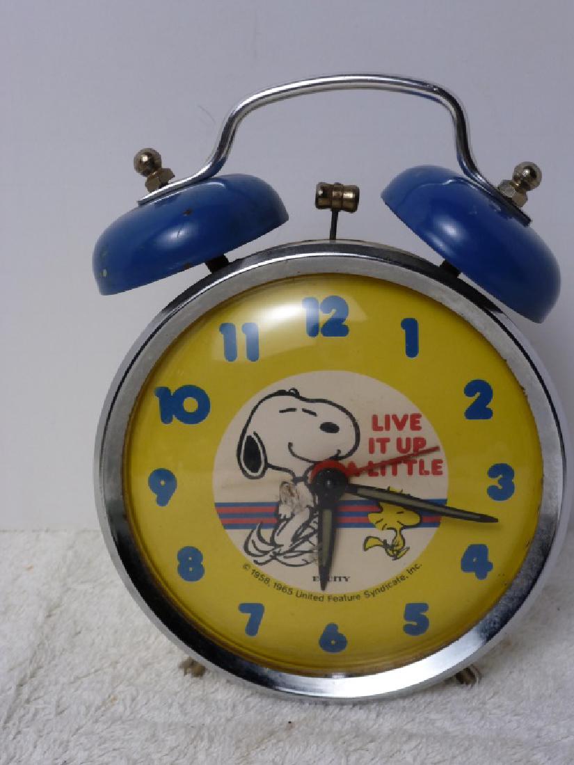Snoopy Alarm Clock: 6 inches high. Overwound.