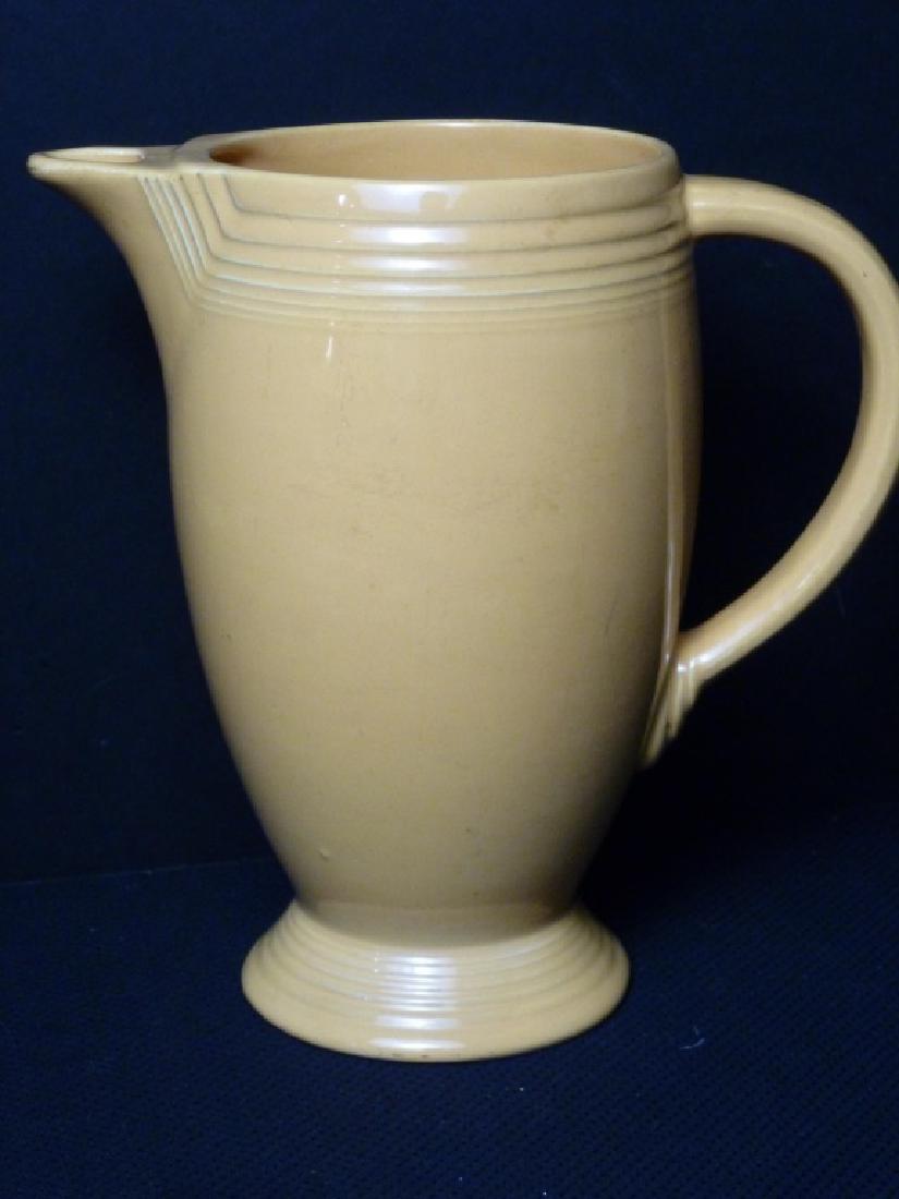 Fiestaware Pitcher, Light Yellow: 7 inches high.