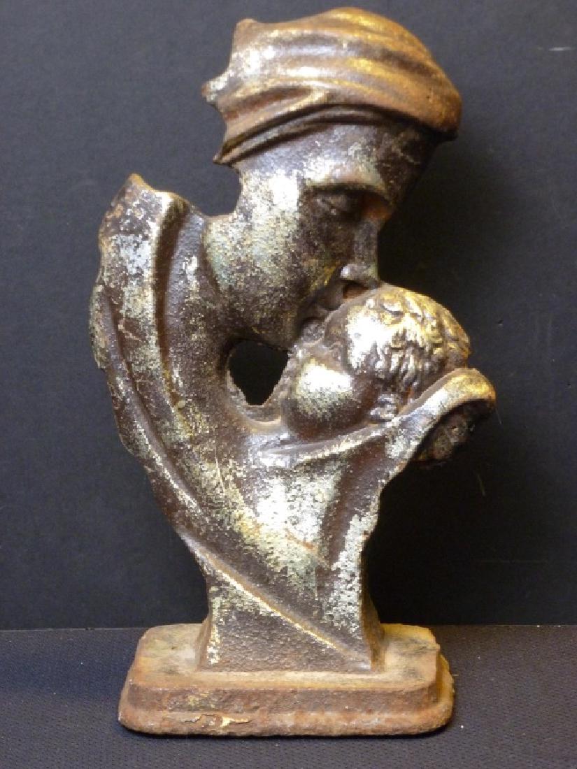Cast Iron Mother & Child: Possibly a door stop. 10.5 h x 5 w x 3.5 d inches.