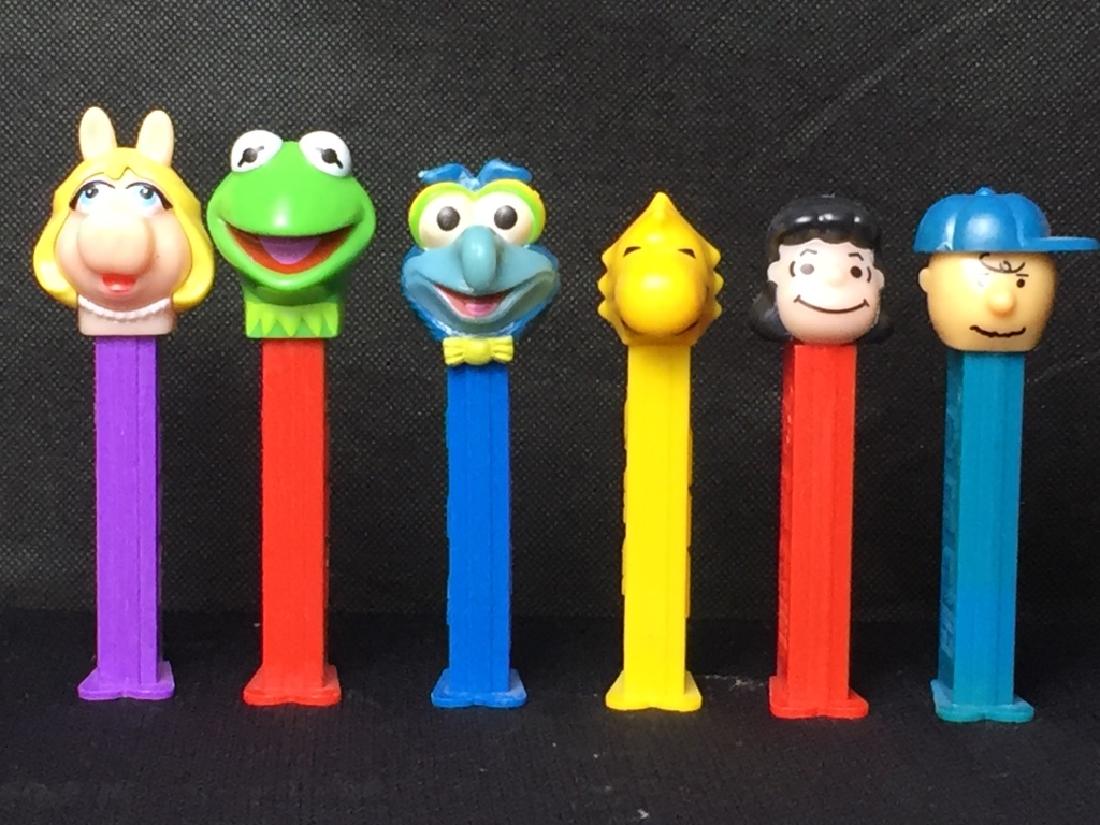 Pez Muppets & Peanuts Lot: Miss Piggy, Kermit the Frog, Gonzo, Woodstock, Lucy, and Charlie Brown. All have feet. #Pez