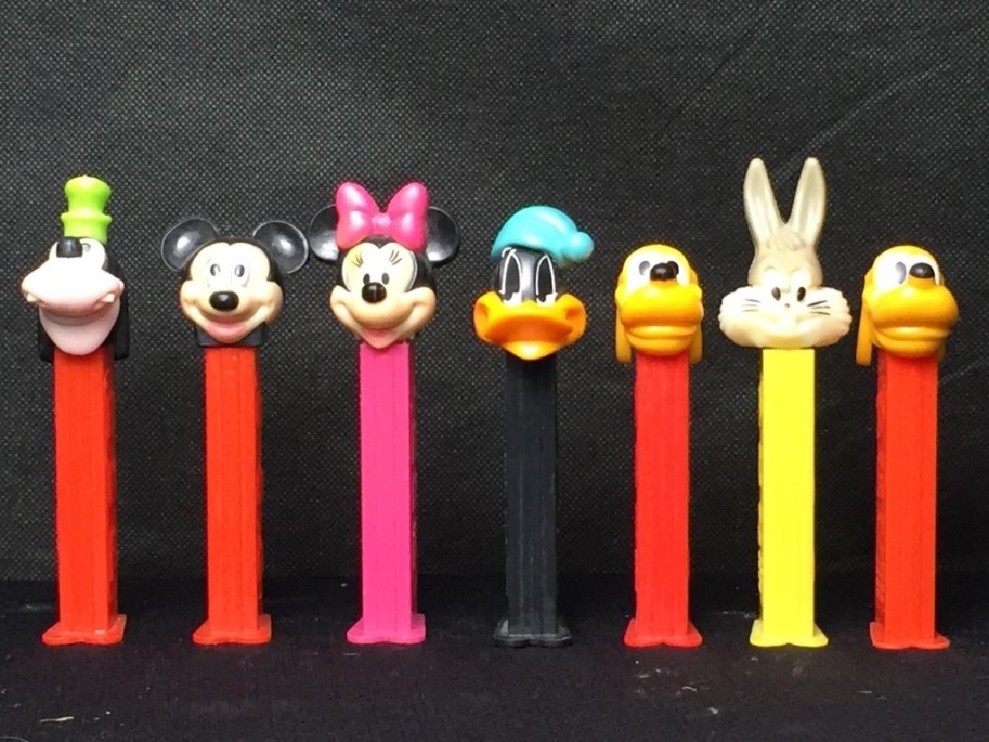 Pez Disney Lot: Goofy, Mickey, Minnie, Donald, (2) Pluto, and Bugs, all with feet. #Pez