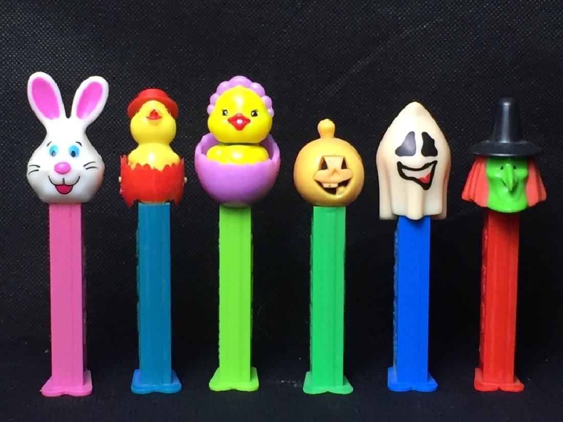 Pez Easter & Haloween Lot: Bunny, (3) various chicks, ghost, and witch, all with feet. #Pez