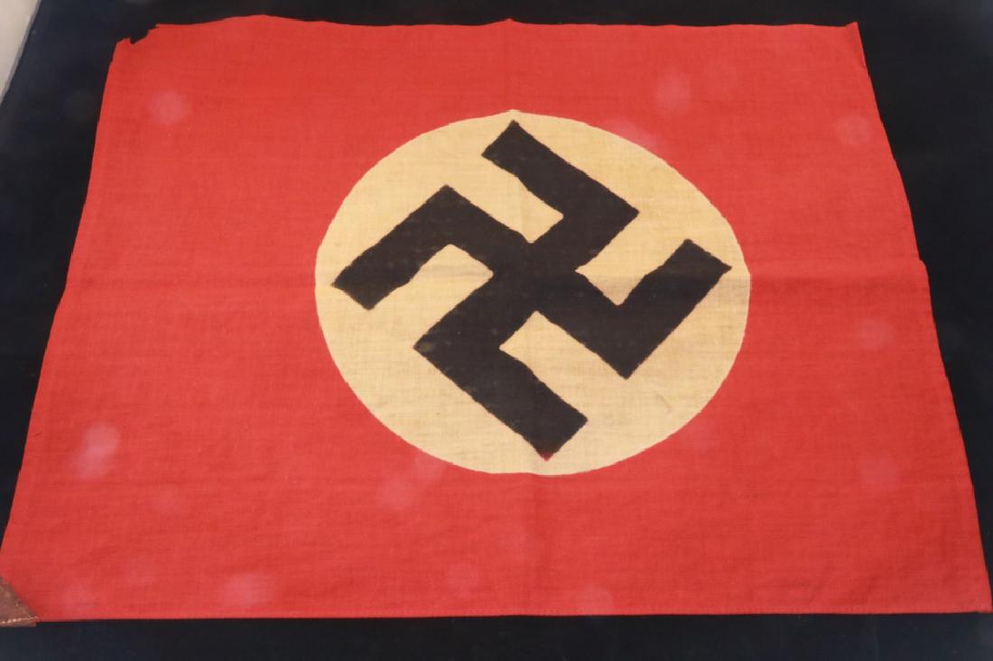 Nazi Flag: Genuine WW2 German Nazi Flag. With two leather cornor tabs for haning this was possibly used as a decorative flag hung with other decorative flags. 17w x 13h inches. #FlagNazi