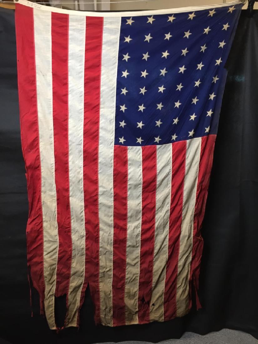 48 Star American Flag: Tattered on long edge. 4l feet x 6w feet. #AmericanFlag48Star