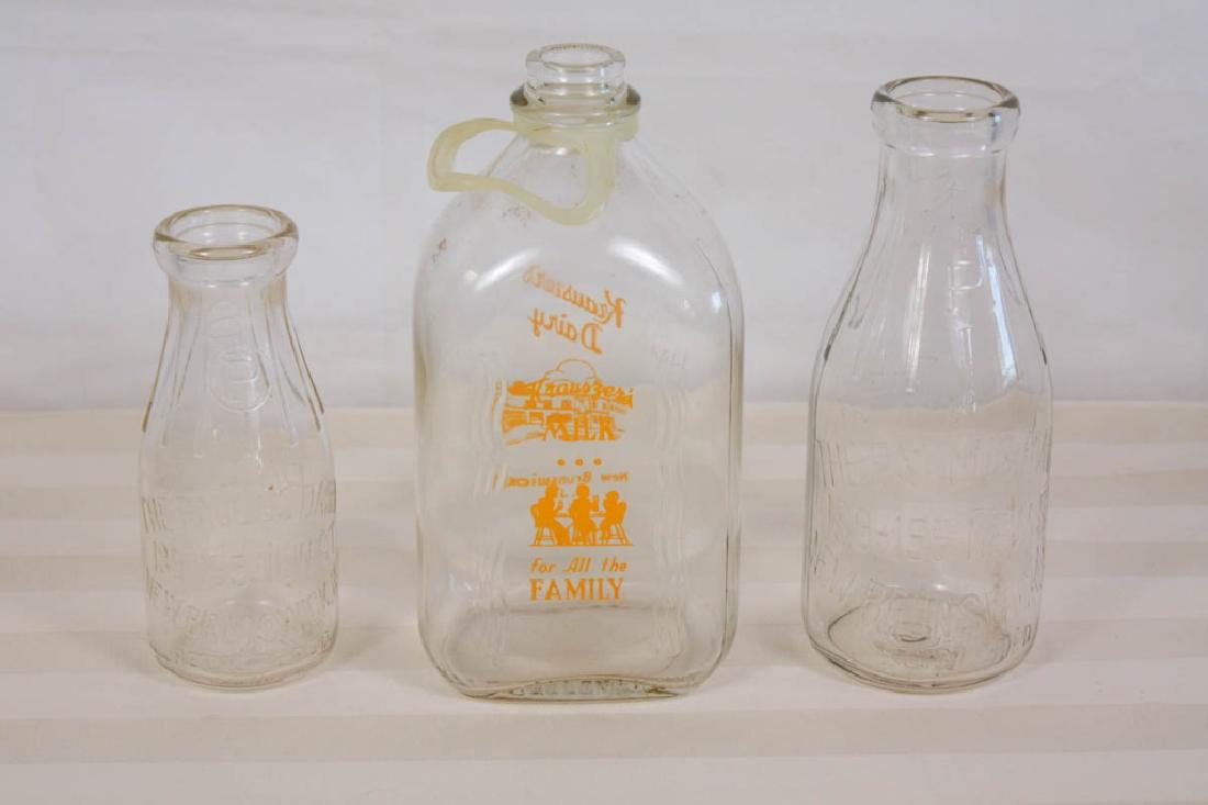 NJ Local Milk Bottles (3): Including Krauszer's Dairy, New Brunswick, NJ - half gallon 10 H inches, The Paulus Dairy, New Brunswick, NJ - one pint, 7 H inches & one quart, 9.5 H inches. #milkbottles #krausers #newbrunswick #new