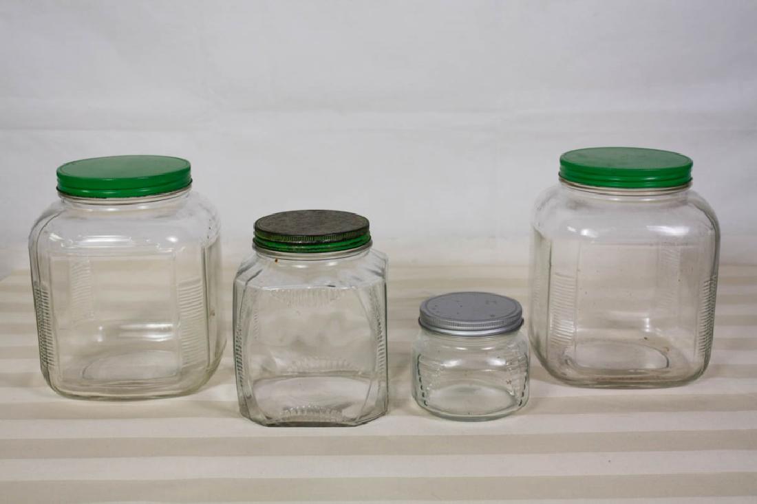 Clear Glass Vintage Biscuit Jars (4): Screw top lids. 2 large 8 H, medium 6.5 H, small 3.5 H inches. #vintageglass #biscuitjars