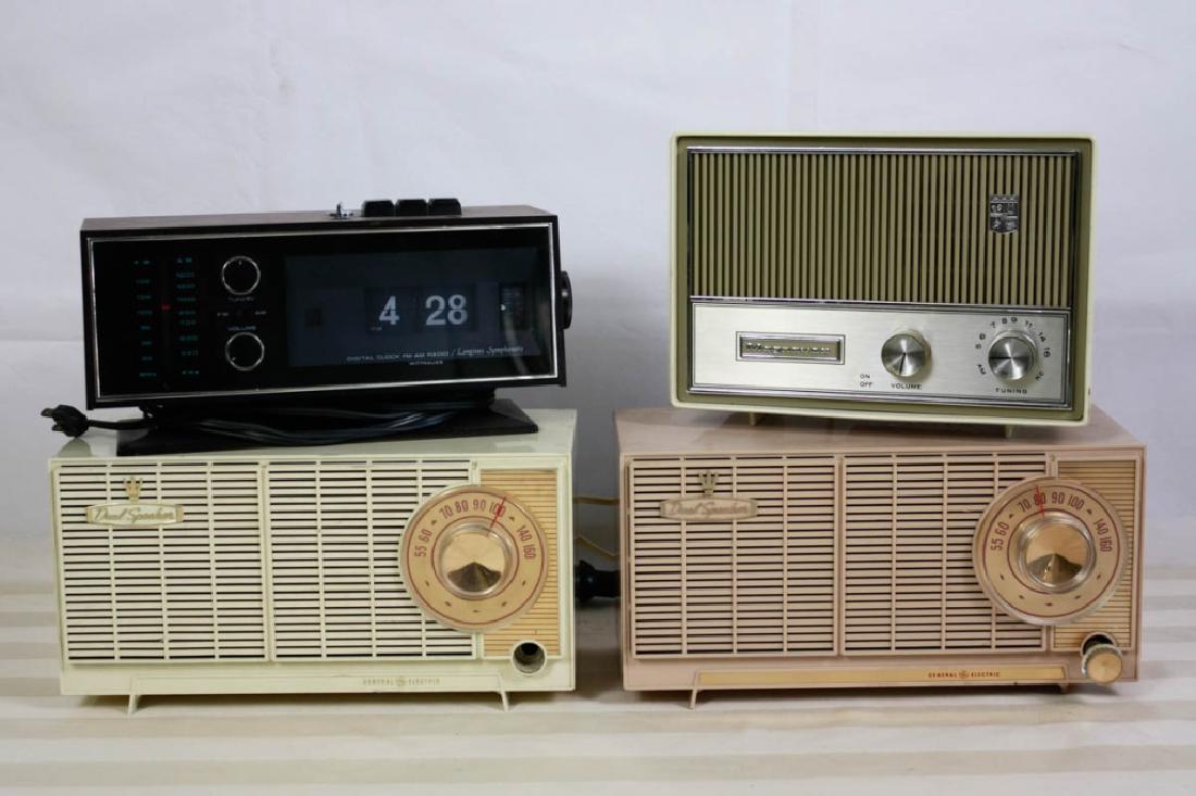 Vintage Radios (4): Including (2) General Electric Dual Speaker radios, Magnavox radio & Wittnauer Clock FM/AM radio. GE, 6 H x 12 W x 5.5 D inches. Magnavox, 7 H x 9.5 W x 5 D inches. Wittnauer, 5 H x 11 W x 4.5 D inche