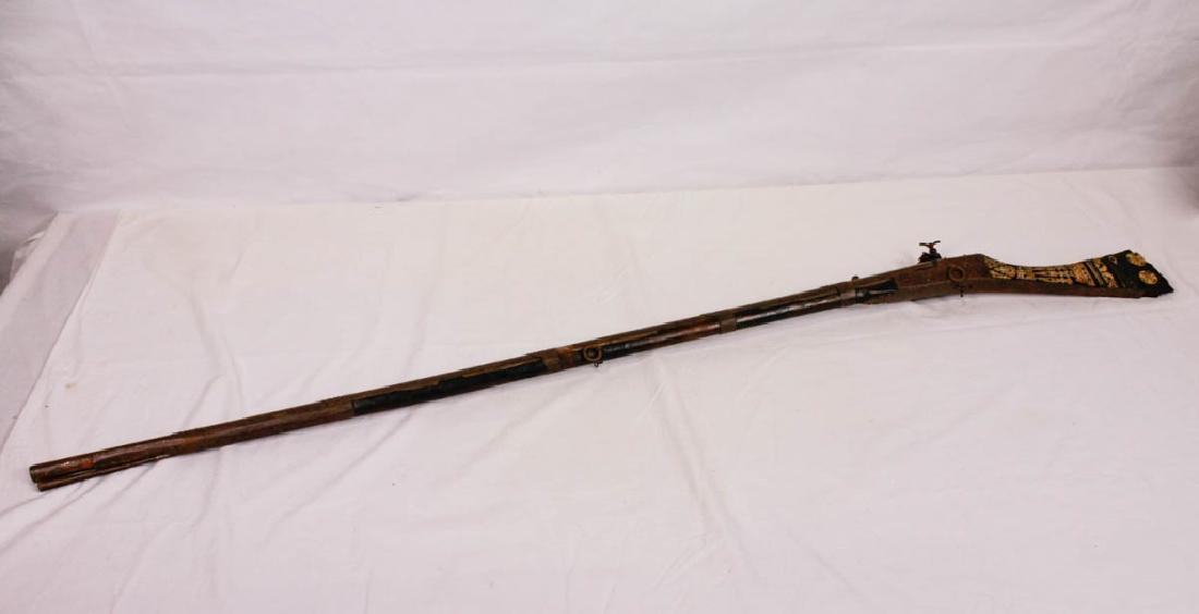 Turkish Gun with Inlaid Mother-of-Pearl Handle: 59h inches. Poor condition. DISCLAIMER: All firearms are sold as collector's items only - we do not accept responsibility as to the shooting safety or reliability of any antique firearm. Any city or s