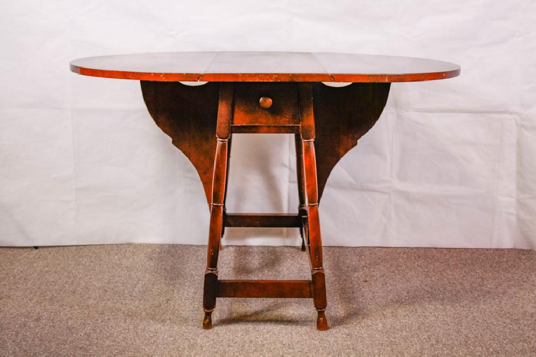 Oval Top Drop Leaf Table: 27h x 44w (leaves open) x 30d inches. 13.5w inches (leaves closed). Has wear. #VintageFurniture #AntiqueFurniture