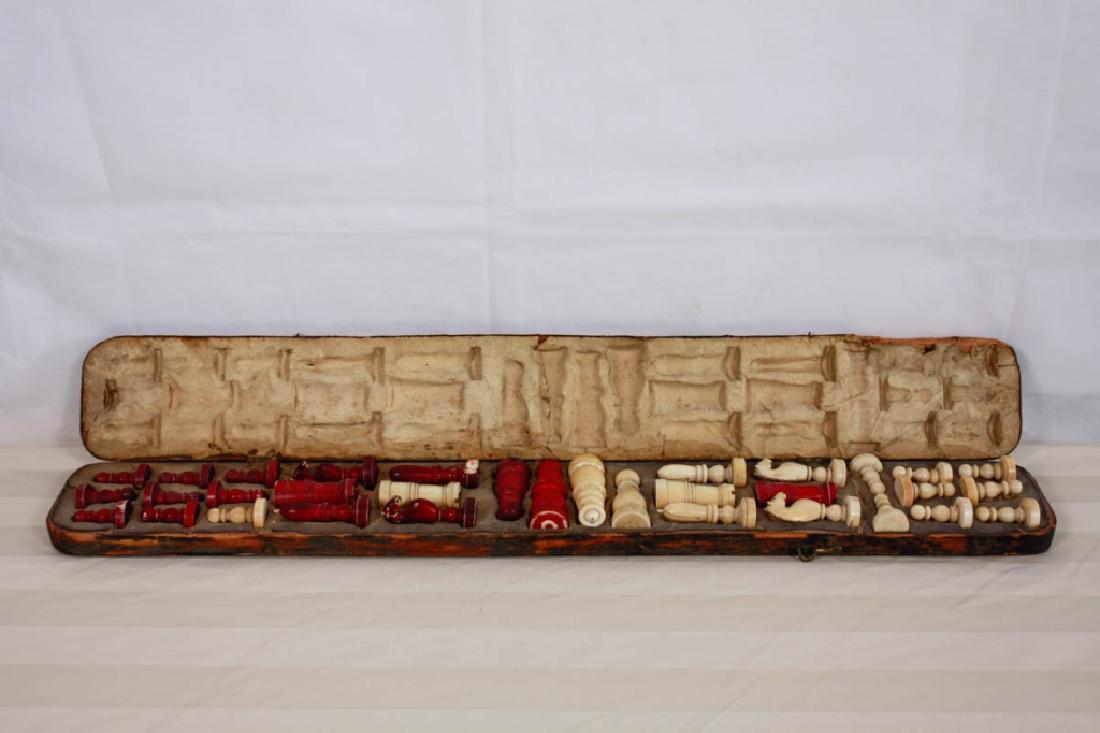 Bone Chess Set Red & White in Case: Case, 29.5 H x 4 W inches. Case does not close due to cracking and expansion. Some pieces are tight in case. #bonechess #chessset #vintagebone