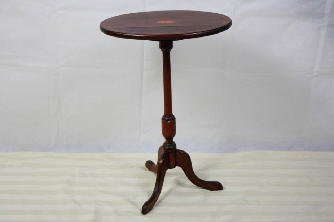 Tilt Top Oval Table With Inlay: Inlay of sunburst design. 27.25 H x 18.75 W inches. Some marking on edge and one leg is separating. Old "dings". #tilttoptable #inlaidwood #Sunburst #AntiqueFurniture #VintageFurniture