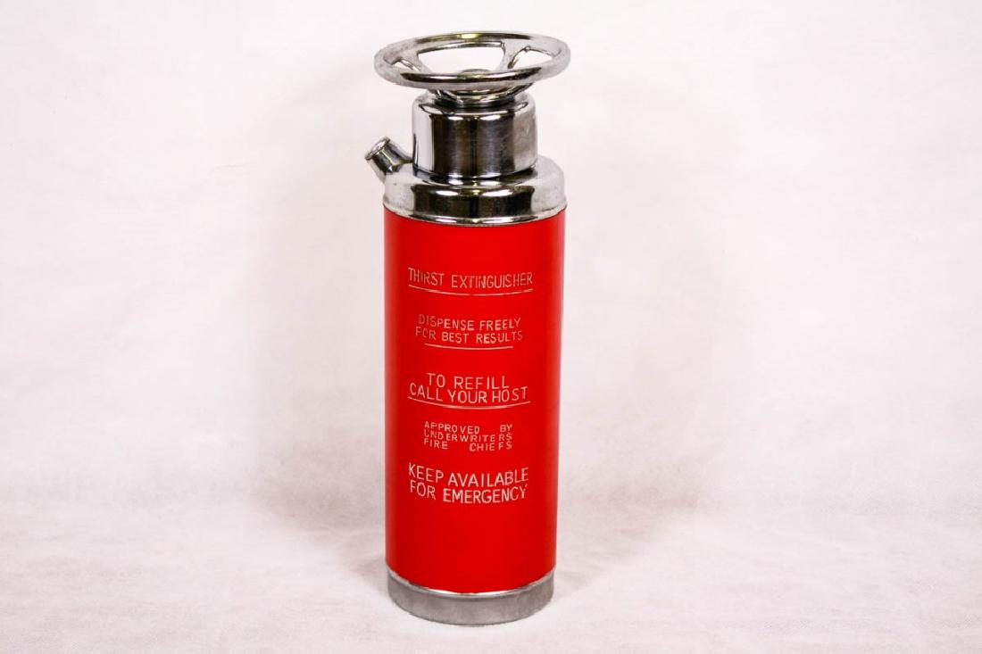 Vintage Thirst Extinguisher Drink Shaker Music Box: "Thirst Extinguisher. Dispense freely for best results. To refill call your host. Approved by underwriters fire chiefs. Keep available for emergency." 11.5h inches. Minor wear to metal. #VintageGlass#