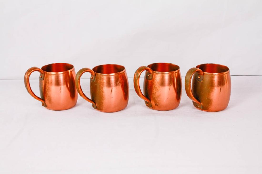 Set of 4 Copper Moscow Mule Mugs: Marked West Bend Solid Copper, Made in USA. 4h x 4.4w inches (with handle). Have wear. #MoscowMule #Copper