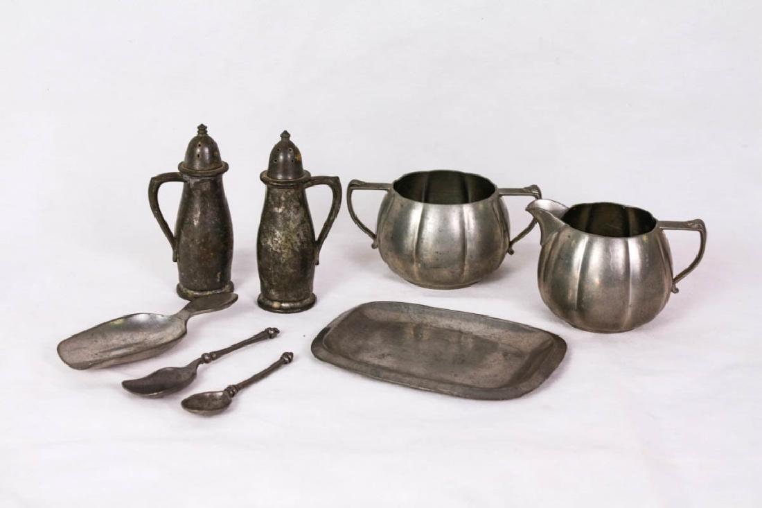 Collection of Pewter Table Accessories: 7 pieces total including sugar & creamer, marked Flagg & Homan Pewter (2.5h inches); salt & pepper shakers, marked Cab Salem Pewter (4.5h inches); silver tray, marked Sportcraft English Pewter, Made i