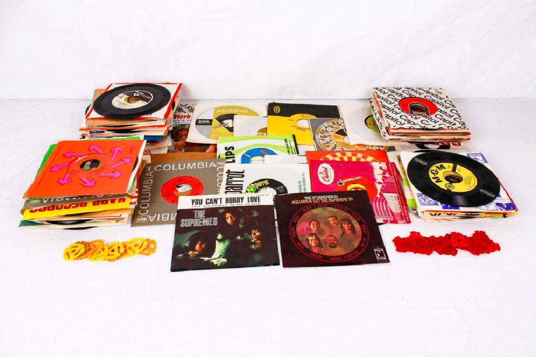 Collection of 45 Records (113): With 26 45 RPM adapters. Including The Mamas and the Papas, Simon & Garfunkel, The Beach Boys, Smokey Robinson & the Miracles, The 4 Seasons, Neil Diamond, The Supremes, Stevie Wonder, and Dione Warwi