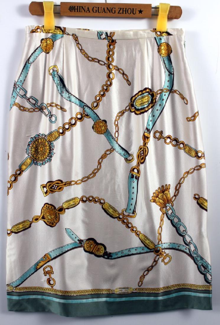 Neiman Marcus Silk Scarf Skirt: Size 8, 100% silk shell, 100% acetate lining. Waist, 28 inches (14 inches each side); 26 inches long. Provenance: From the collection of Tim Hunt & Tama Janowitz #TimHunt #TamaJanowitz #NeimanMarcus