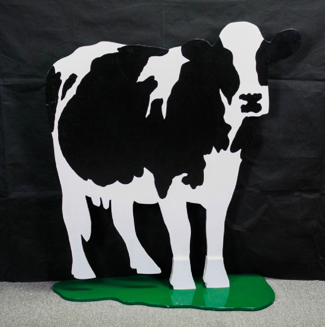 Woody Jackson Signed Rubin's Cow Cut Out: Signed on top by Woody Jackson, American (b. 1970), artist for Ben & Jerry's cows. 48h x 45w x base 17d inches. Minor paint wear. #WoodyJackson #BenandJerrys #IceCream #Cow #WoodyJacksonCow #RubinsCow