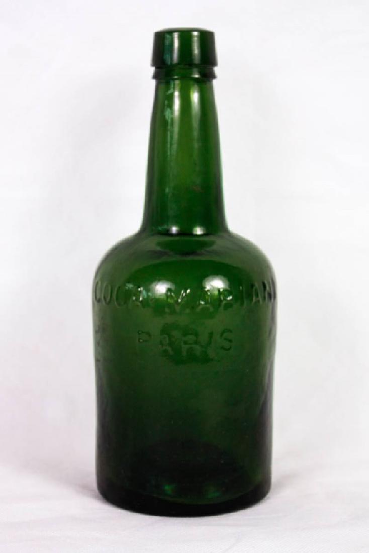 Coca Mariani Bottle Paris, France: Cocaine liquor bottle. Marked Coca Mariani France Paris on bottom. Marked Coca Mariani Paris on front. #CocaineLiquor #VintageGlass