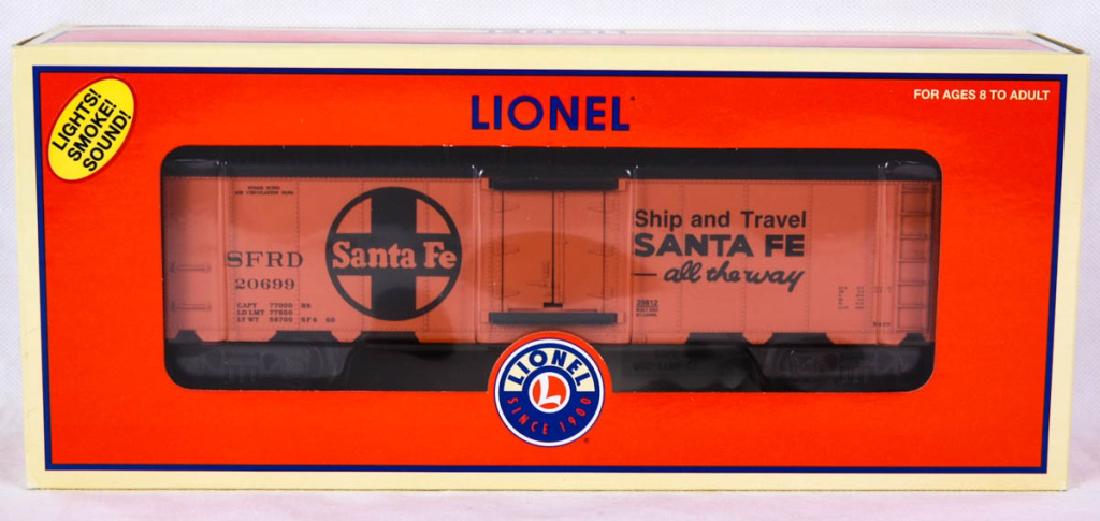 Lionel Santa Fe Hot Box Reefer 29812: 6-29812, 2004. Flickering lights, smoke, screeching and crew dialog, die-cast metal trucks and couplers, metal frame. Mint in box. #Lionel