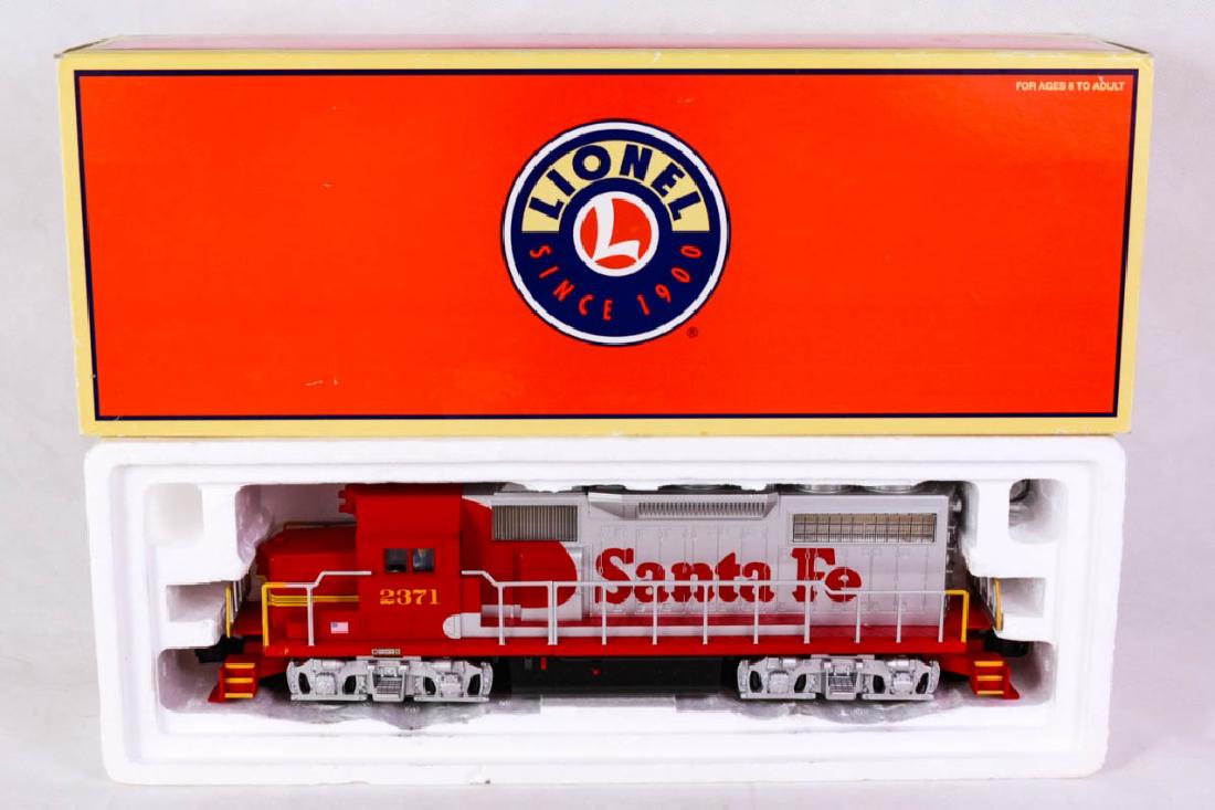 Lionel 28853 Santa Fe 2371 Diesel Locomotive: 6-28853, 2004 GP38. Diesel horn, dual maintenance free can motors, operating headlights, die-cast trucks. Mint in box. #Lionel