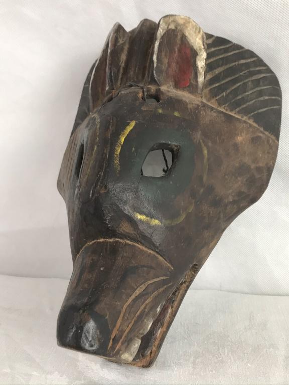 Coyote Hand Carved Wooden Mask, Origin Unknown: Natural wood, red, white, yellow paint. 9.75h x 7.5w x 4.5d inches.