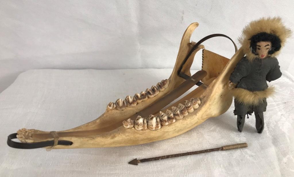 Baleen & Caribou Jaw Bone Sled w/Eskimo & Spear: 4.5h x 11w x 4d inches.