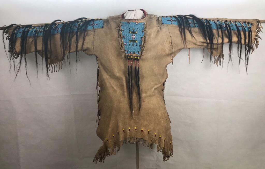 War Shirt of Leather, Beadwork & Horse Hair: Sinew sewn, age uncertain. At the longest points: 36h x 67w at arms and 23w at mid-body area - all approximate, not exact.