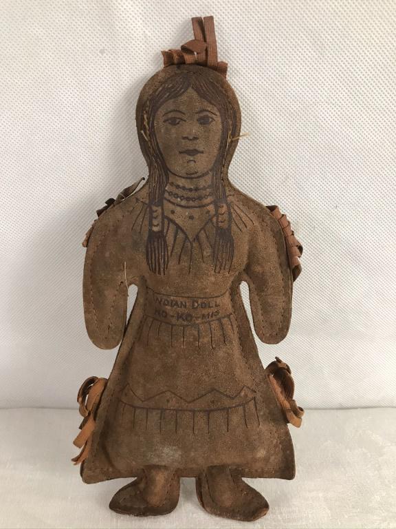 Leather Indian Doll, NO-KO-MIS (Grandmother): Marked Philadelphia, PA. Machine sewn, tear to leather on back of arm. 9h x 4w inches.
