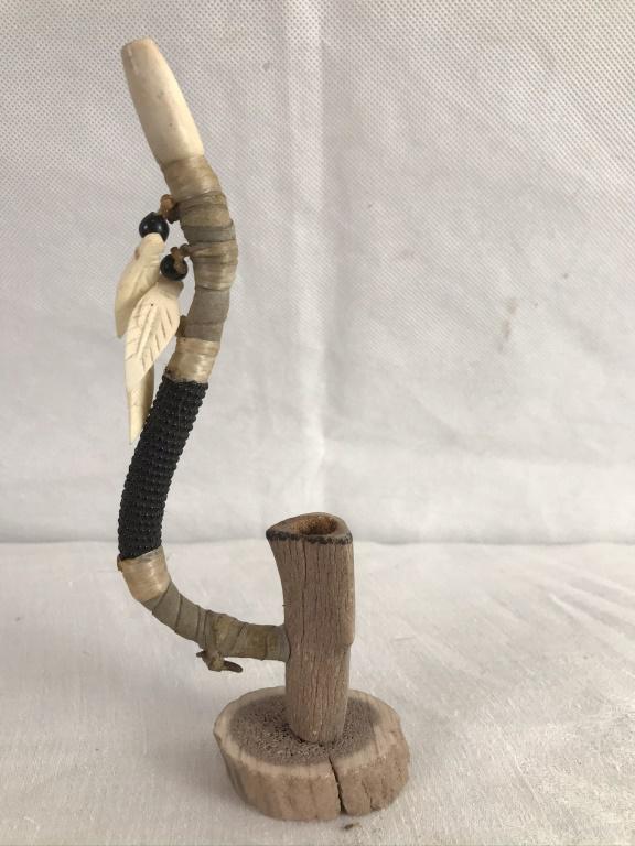 Calumet/Peace Pipe: Made by Margaret Ruo, Navajo tribal affiliation. 7h x 3w inches.