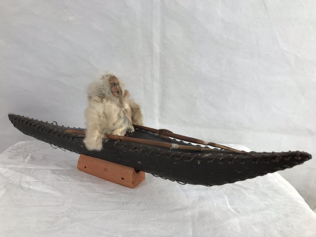 Baleen & Sinew Kayak on Stand w/Eskimo & Spears: Eskimo in fur and 2 spears. Apx. 21 long inches 6.5h including stand.