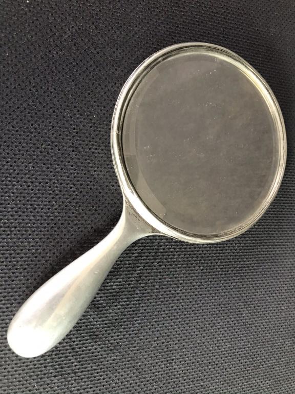 Silver Plated Mirror: Marked: "Simpson H. Mexico" 9.5" long.