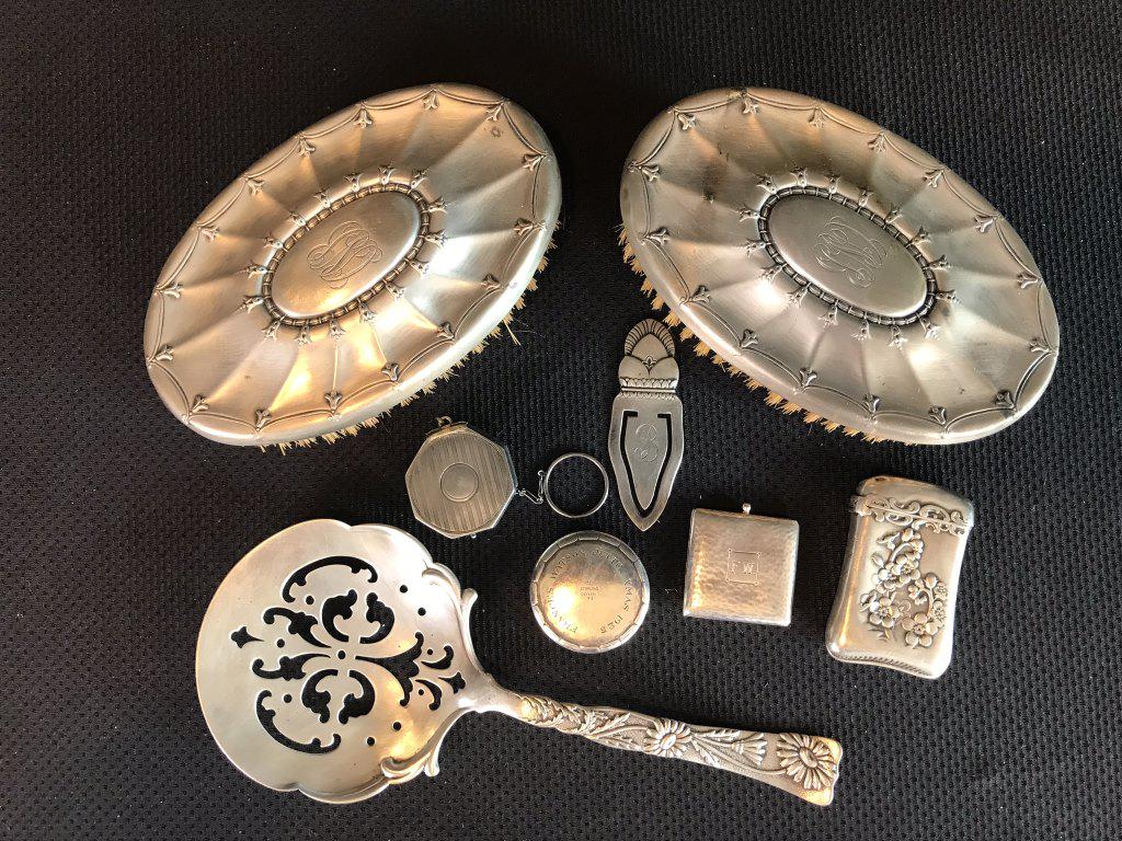 Lot of 8 Sterling Silver Pieces: 2 brushes, slotted serving spoon Tiffany & Co., locket w/ "FW" initials. 6 pieces not including brushes = 152 grams without brushes.