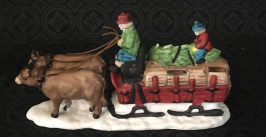 Ox Sled, Dickens Village: Dept. 56 in box 5951-0. This lot ships from Jacksonville, Florida.