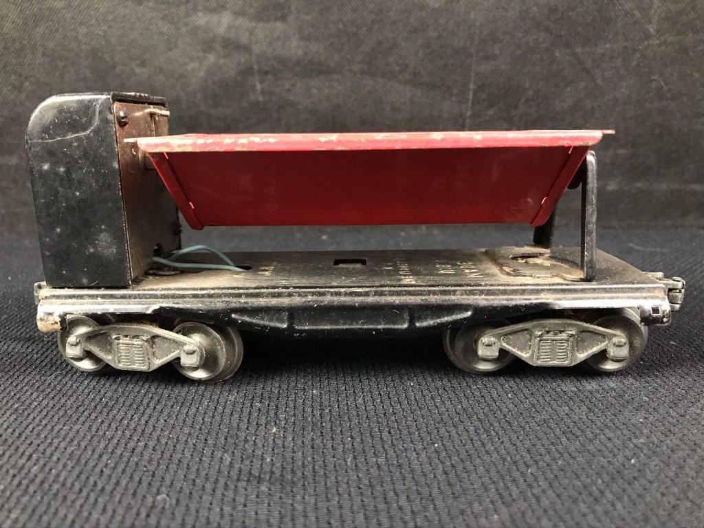 Lionel Dump Car: 3559 Staple end trucks w/coil couplers. Complete
