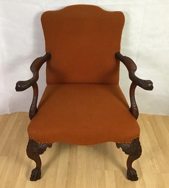 Georgian Style English Carved Custom Snake Chair: Upholstered in orange fabric. 38h x 24d x 30w inches. Note: This lot can not be shipped in house. Buyer must arrange shipping for this item or pick up this lot.