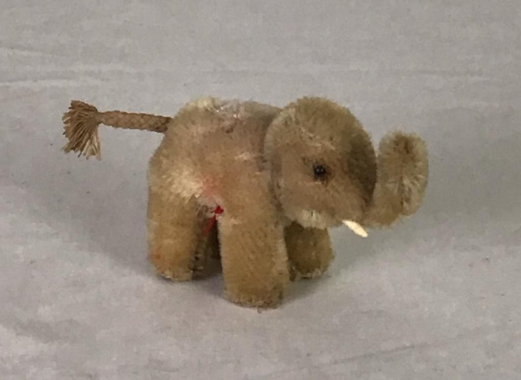 Steiff Elephant: Glass eyes and tusks, no tag 2.5h x 5w inches