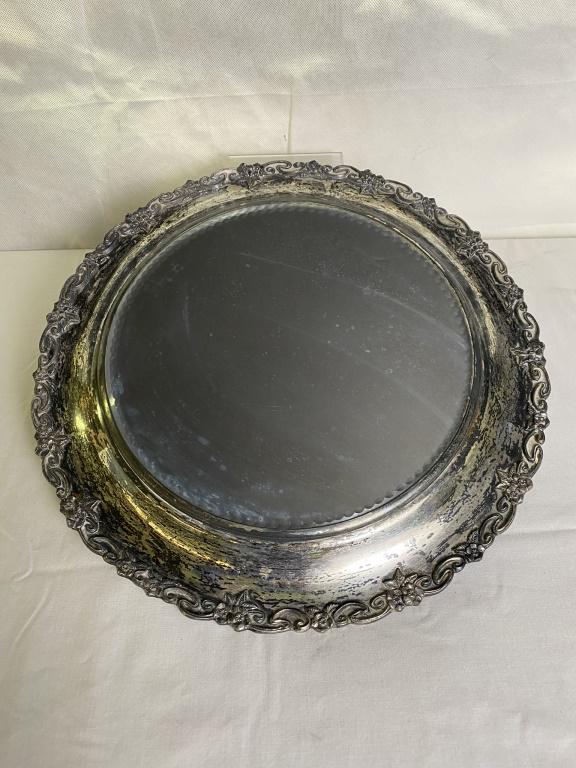Round Mirror with Silverplate Frame: 14d overall, mirror 7.5d inches.